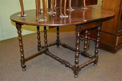 Lot 366 - An early 18th century oak gateleg table