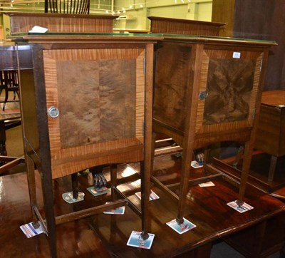 Lot 370 - A pair of mahogany bedside cupboards with plate glass top