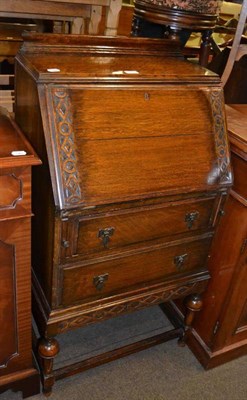 Lot 379 - Circular table and oak bureau