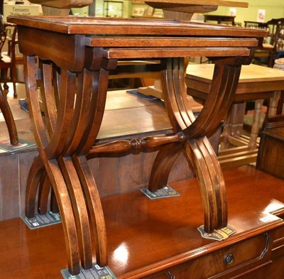 Lot 382 - Nest of three mahogany tables