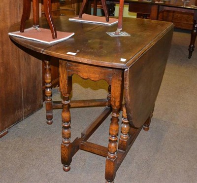 Lot 384 - An 18th century small oak gateleg table