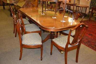 Lot 393 - Charles Barr twin pedestal dining table and eight chairs