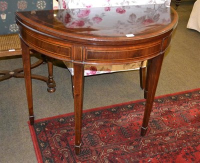 Lot 401 - 19th century mahogany fold-over card table