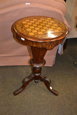 Lot 404 - A Victorian walnut trumpet shaped work table