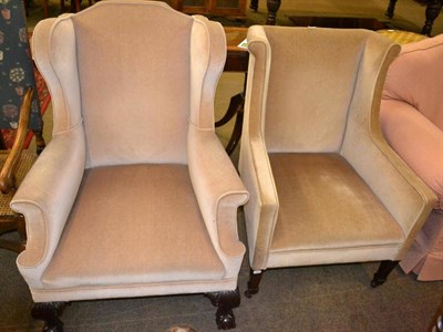 Lot 406 - Georgian style wing armchair on claw and ball feet upholstered in mushroom velour and a similar...