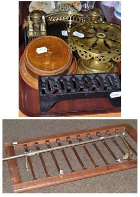Lot 20 - Wooden window grille, brass curtain hanger, trivet, airbrick, inkwell and two wooden trophy cut...