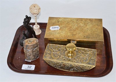 Lot 32 - A Chinese ivory puzzle ball and stand, a Chinese white metal dragon decorated box and cover, an...