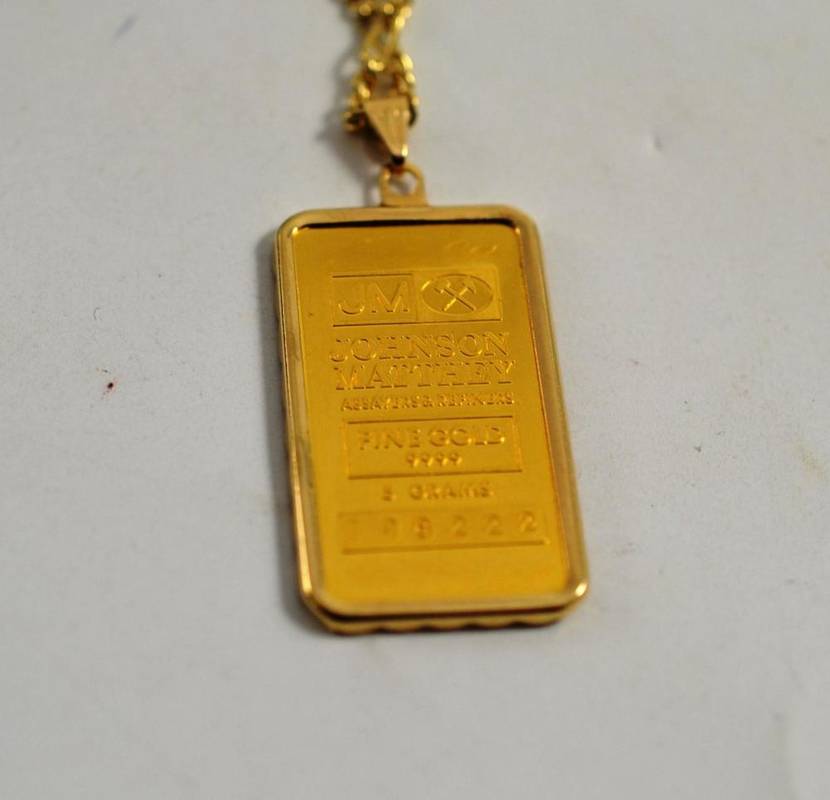 Lot 63 - Johnson Mathey ingot pendant on chain