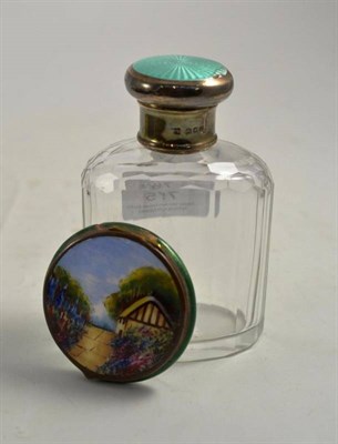 Lot 75 - A silver topped scent bottle and compact
