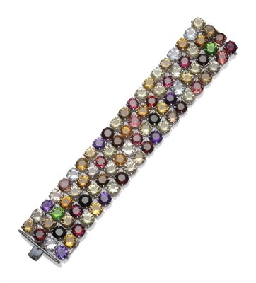 Lot 289 - A Multi Gemstone Bracelet, probably by Jooal, rows of multi-coloured gemstones, including...