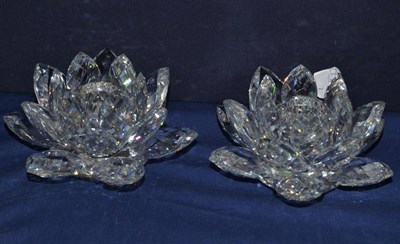 Lot 100 - A pair of Swarovski crystal flower form candlesticks