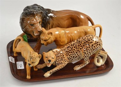 Lot 104 - A Beswick lion, two lionesses and a cheetah