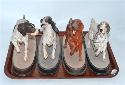 Lot 129 - Four Beswick dogs including two Setters, a Springer and a Pointer