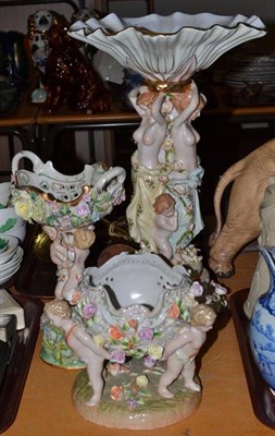 Lot 141 - Three Continental figural encrusted centrepieces