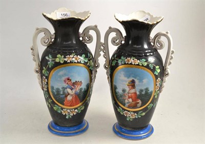 Lot 156 - A pair of Paris porcelain vases painted with portrait panels