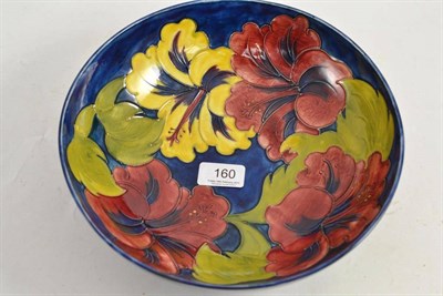 Lot 160 - A Moorcroft Hibiscus pattern bowl, 26 cm wide, paper label to base