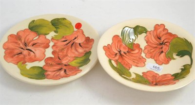 Lot 165 - A Moorcroft Hibiscus pattern bowl, 25 cm wide and a pattern plate (2)