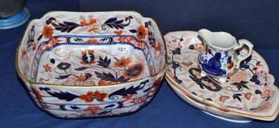 Lot 181 - A 19th century Staffordshire Imari square section bowl, two oval dishes and a jug (4)