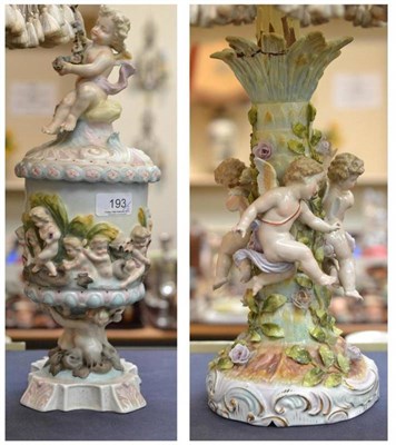 Lot 193 - Late 19th/early 20th century Continental Cupid encrusted lamp and a vase and cover (2)