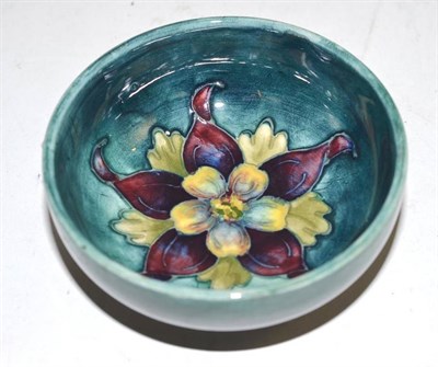 Lot 194 - A Moorcroft small pin dish