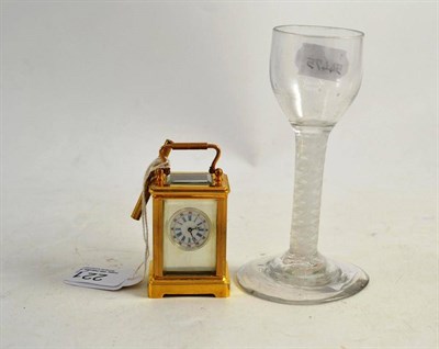 Lot 221 - Miniature carriage clock and early wine glass