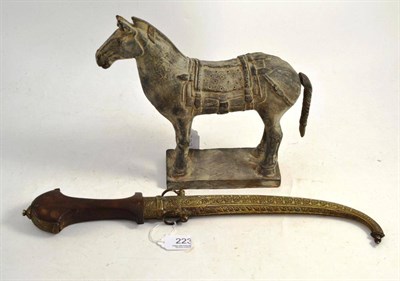 Lot 223 - A terracotta horse and Indian dagger