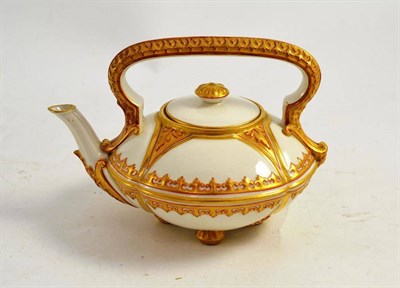 Lot 228 - An Aesthetic movement Royal Worcester ivory and gilt small tea kettle and cover