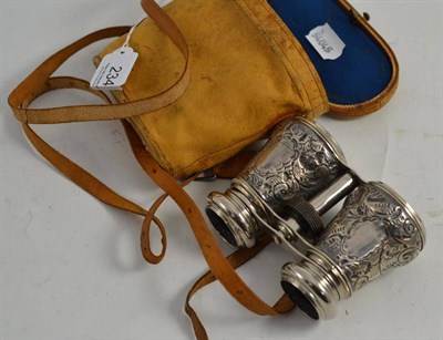 Lot 234 - A pair of silver cased opera glasses