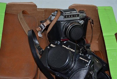 Lot 242 - A pair of binoculars, two cameras etc