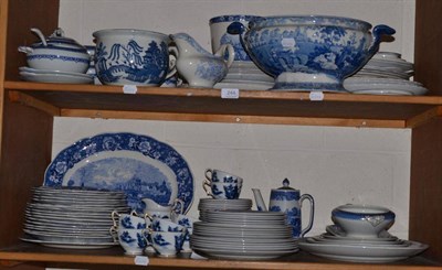 Lot 244 - Two shelves of English blue and white pottery, including tea and dinner wares