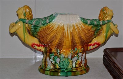 Lot 264 - A Minton style Majolica jardiniere with shell motif and two maidens