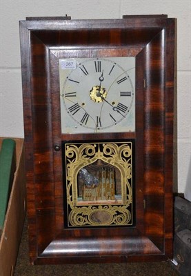 Lot 267 - An American shelf striking clock and two weights