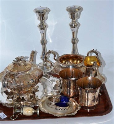 Lot 277 - A pair of modern silver candlesticks, a Victorian three piece plated tea service, napkin rings,...