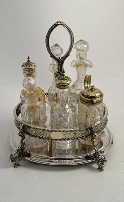 Lot 286 - A plated cruet stand with six bottles