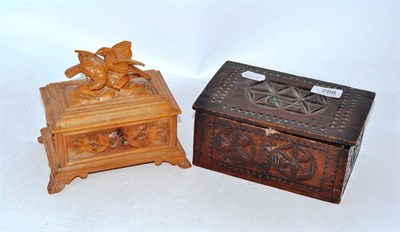 Lot 288 - A carved olive wood sewing casket and another