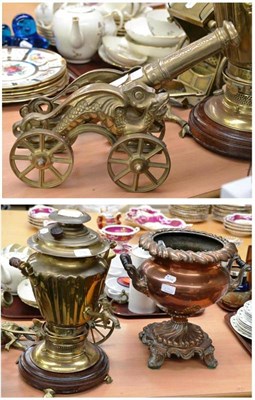 Lot 296 - A copper wine cooler, a brass samovar, brass canon and a brass horse and carriage