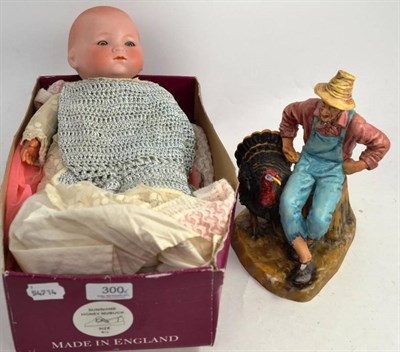 Lot 300 - A Royal Doulton figure Thanksgiving HN 2446 and an Armand Marseille doll