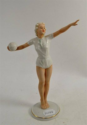 Lot 337 - An Art Deco Schaubach glazed porcelain figure of a lady with ball, model 1285