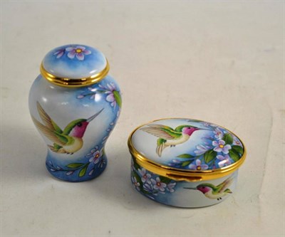 Lot 348 - A Moorcroft Shintaki enamel vase and cover painted with a hummingbird and a similar box, both boxed