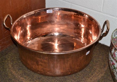 Lot 373 - A large copper twin handled preserve pan