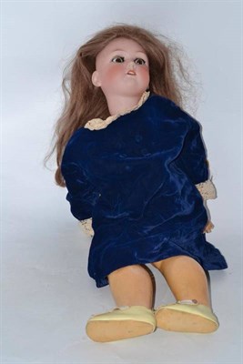 Lot 377 - Large 1349 Jutta bisque socket head doll with blue velvet coat