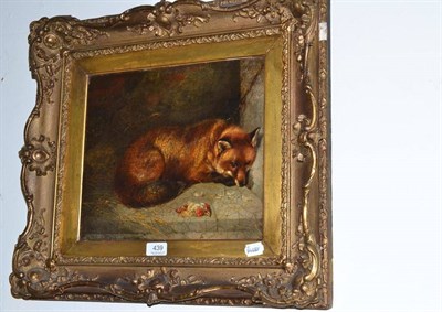 Lot 439 - George Arnfield, fox with head of dead chicken, oil on canvas, 29cm x 34cm