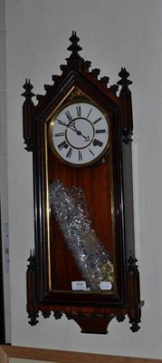 Lot 458 - A Vienna type striking wall clock