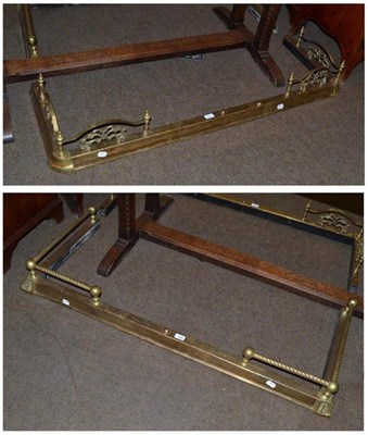 Lot 496 - Two adjustable brass fireside fenders