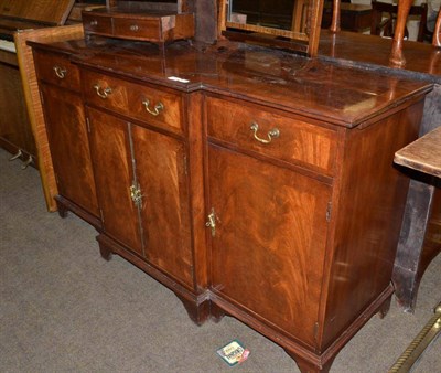 Lot 497 - A reproduction breakfront sideboard