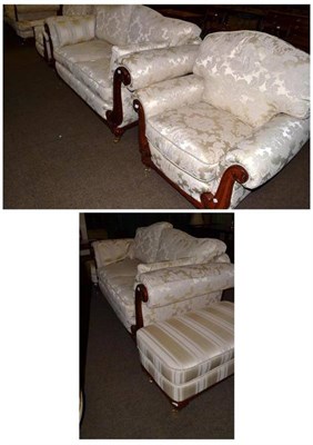 Lot 518 - A pair of two seater sofas, a pair of chairs and a pair of footstools