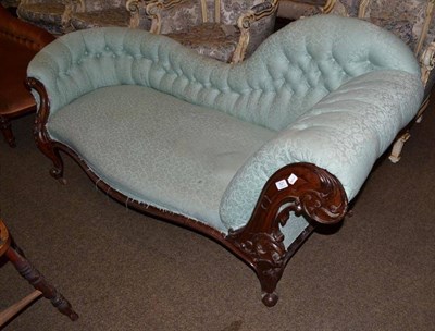 Lot 521 - A Victorian carved mahogany button back chaise