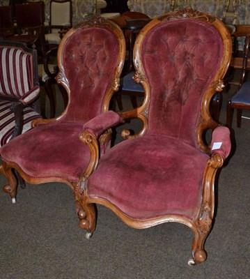 Lot 526 - A Victorian carved walnut elbow chair and a matching nursing chair