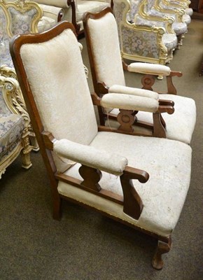 Lot 534 - A pair of oak framed Edwardian open armchairs