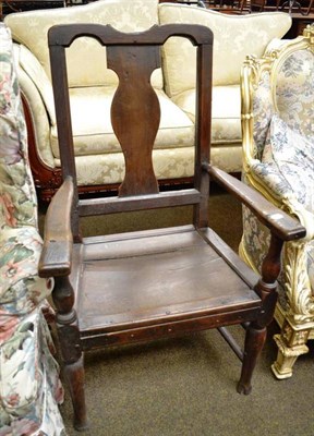 Lot 536 - An 18th century oak elbow chair